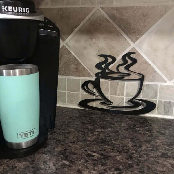 metal art made looking like a coffee mug