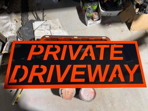 Custom metal sign made that says private driveway