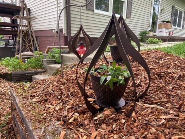 Custom metal decor for holding plants