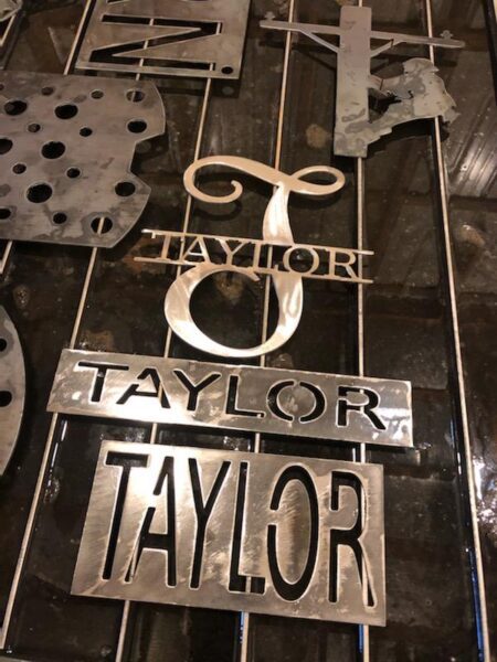 Custom metal signs with name on them