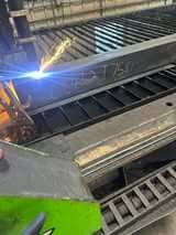 plasma tables that is cutting square tube.